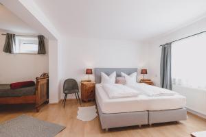 Ένα ή περισσότερα κρεβάτια σε δωμάτιο στο Ferienhaus Hohe Tauern in Piesendorf +54 φωτογραφίες