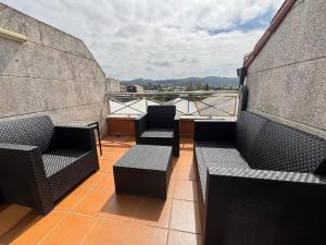 Et opholdsområde på Ático Arousa Luxe stay