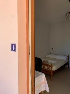 Postel nebo postele na pokoji v ubytování Begaj Rooms