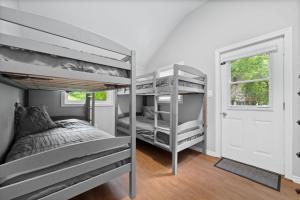 Ένα ή περισσότερα κρεβάτια σε δωμάτιο στο Lake lodge 6 +2 φωτογραφίες