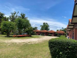 Zahrada ubytování โพธิ์ทองริมทุ่ง Pothong Rimtung Hotel