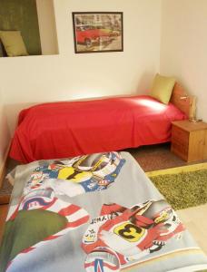 Cama o camas de una habitación en Ferienwohnung am Nürburgring 2.OG
