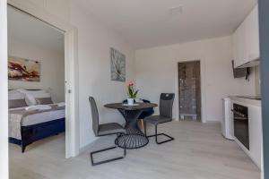 Posteľ alebo postele v izbe v ubytovaní Penthouse Apartments Dora Kukljica