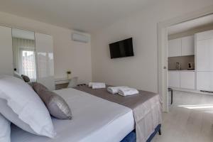 Posteľ alebo postele v izbe v ubytovaní Penthouse Apartments Dora Kukljica