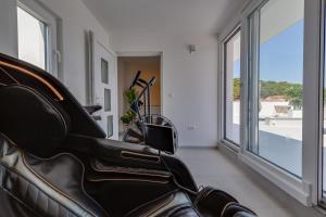 Posedenie v ubytovaní Penthouse Apartments Dora Kukljica