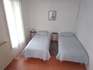 Postel nebo postele na pokoji v ubytování Chambre privée a Arcueil - Cachan