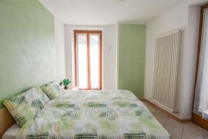 Postel nebo postele na pokoji v ubytování Bed and Breakfast Galet
