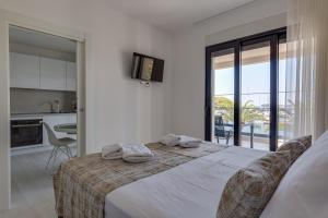 Posteľ alebo postele v izbe v ubytovaní Penthouse Apartments Dora Kukljica