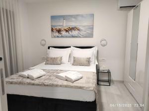 Posteľ alebo postele v izbe v ubytovaní Penthouse Apartments Dora Kukljica
