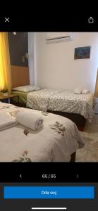 Postel nebo postele na pokoji v ubytování Kılavuz otel