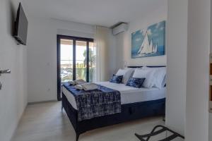 Posteľ alebo postele v izbe v ubytovaní Penthouse Apartments Dora Kukljica