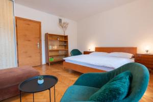Postel nebo postele na pokoji v ubytování Holiday House Mária