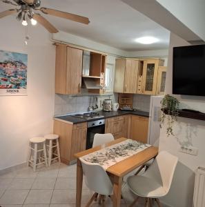 Kuchyň nebo kuchyňský kout v ubytování Magnolia Apartments