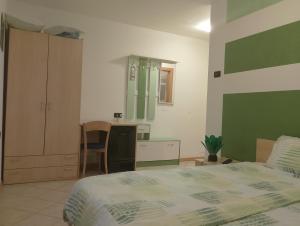 Postel nebo postele na pokoji v ubytování Bed and Breakfast Galet
