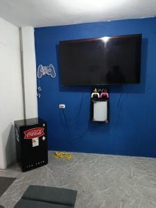 TV a/nebo společenská místnost v ubytování Fun Apartment Piura