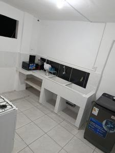 Kuchyň nebo kuchyňský kout v ubytování Fun Apartment Piura