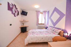 Postel nebo postele na pokoji v ubytování Bed and Breakfast Galet