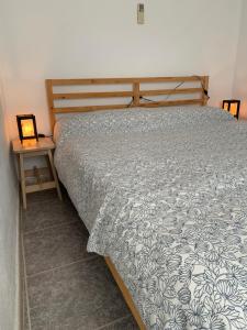 Posteľ alebo postele v izbe v ubytovaní Casa Aire de Mar
