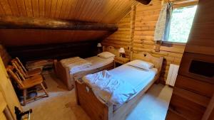 เตียงในห้องที่ Chalet scandinave excellente situation GERARDMER XONRUPT