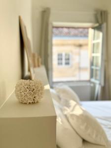 Postel nebo postele na pokoji v ubytování Le Clos Notre Dame hôtel particulier hypercentre Poitiers