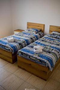 Ένα ή περισσότερα κρεβάτια σε δωμάτιο στο Armonía Residence & Restaurant