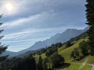 a view of a valley with mountains in the background at Haus am Berg in Mühlbach am Hochkönig