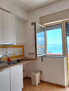 Η κουζίνα ή μικρή κουζίνα στο Il mare negli occhi