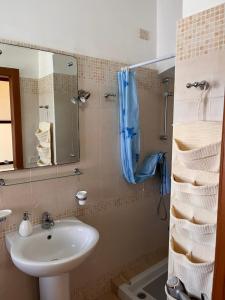 a bathroom with a sink and a mirror at B&B Casale Spisari in Galatone +67 photos
