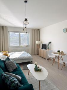 Postel nebo postele na pokoji v ubytování PonaSpace Apartment