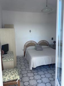 Postel nebo postele na pokoji v ubytování House Nino