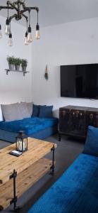 TV a/nebo společenská místnost v ubytování Dimitrios Loft Apartment