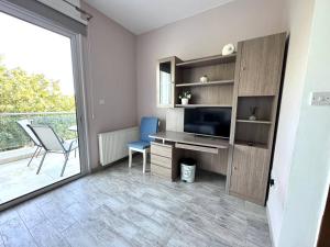 Μια τηλεόραση ή/και κέντρο ψυχαγωγίας στο Konia Green View +20 φωτογραφίες