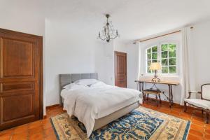 Ένα ή περισσότερα κρεβάτια σε δωμάτιο στο Villa The Oasis - Calm - Pool - Chic and Farniente