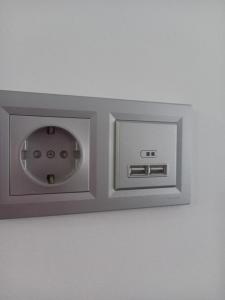 an electrical outlet on a ceiling with aperature at Home from home in Noya