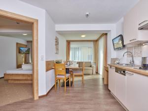Kuchyň nebo kuchyňský kout v ubytování Appartement Gästehaus Bergkristall