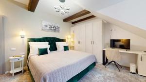 Casa Renium客房内的一张或多张床位
