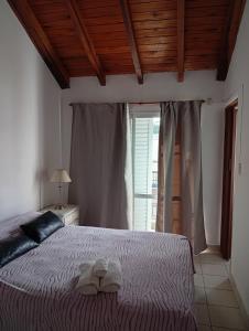 Postel nebo postele na pokoji v ubytování Departamento en el centro de Victoria Entre Rios + 20 fotografií