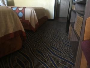Postel nebo postele na pokoji v ubytování Super 8 by Wyndham Cedar City