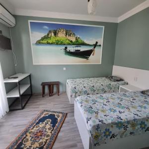 Postel nebo postele na pokoji v ubytování Villa NiNo + 37 fotografií