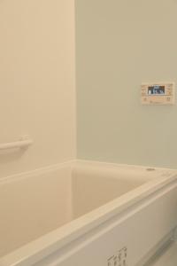 a white bath tub in a room with a wall at Komorebi no Yado - Vacation STAY 19011v in Goto