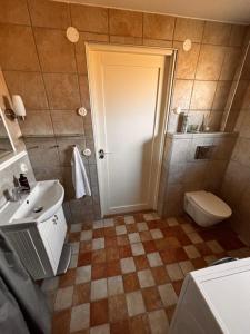 Koupelna v ubytování Fint litet hus i Mellbystrand