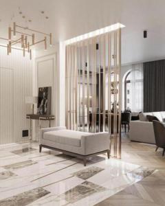 a living room with a couch and a table at Luxary Home Flora inn in Baku