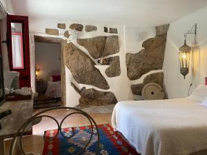 Postel nebo postele na pokoji v ubytování Casa de David
