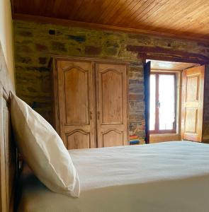 Ένα ή περισσότερα κρεβάτια σε δωμάτιο στο Sweet Quintanilha