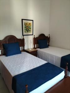 Postel nebo postele na pokoji v ubytování Casa dos Avós + 23 fotografií