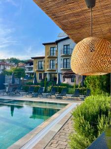 Bazén v ubytování Boutique Hotel Colosseo nebo v jeho okolí