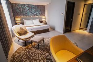 Postel nebo postele na pokoji v ubytování Hotel De Grand Villa By IGI Airport