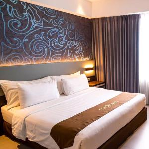 Postel nebo postele na pokoji v ubytování Hotel De Grand Villa By IGI Airport