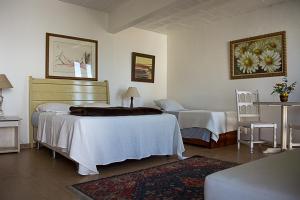 Кровать или кровати в номере Atlântico Hotel