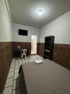 TV a/nebo společenská místnost v ubytování Oberon Business Hotel
